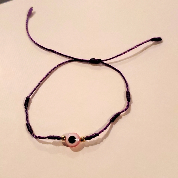 Jewelry - Pink Evil eye bracelet with purple string
